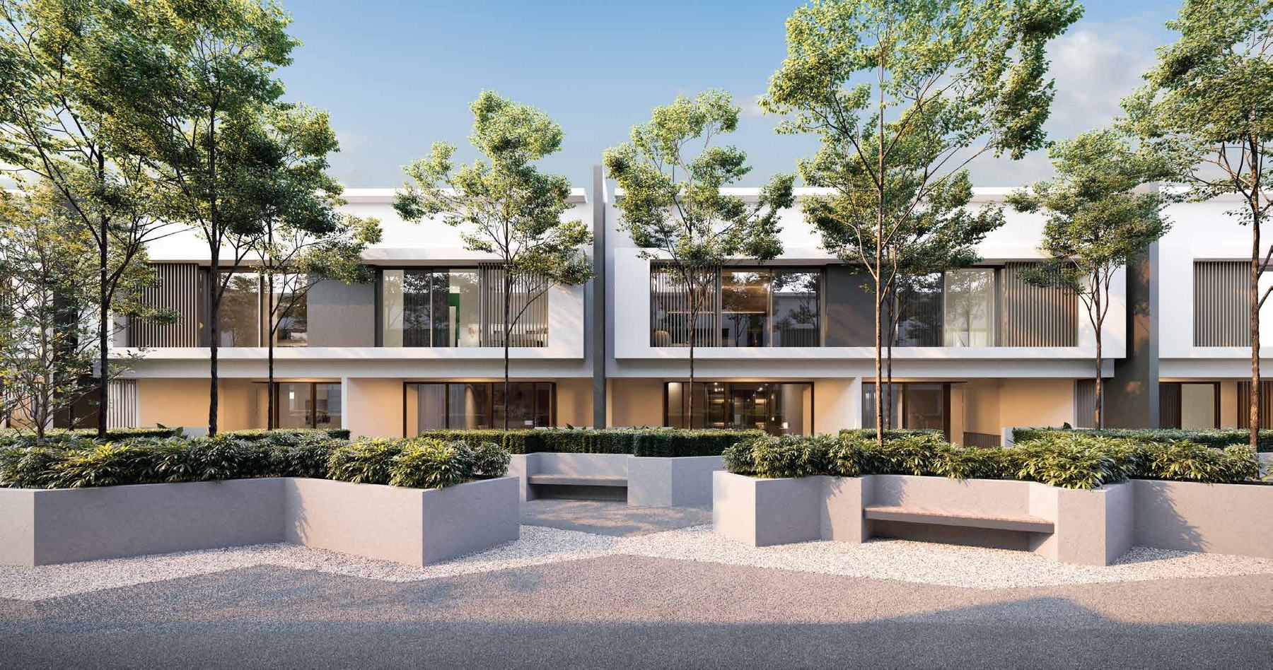 Row of contemporary townhouses with wood-slat balconies among mature trees at dusk