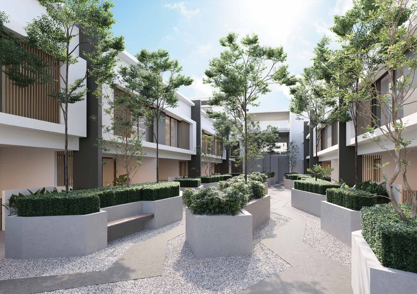 Landscaped courtyard walkway between rows of modern minimalist townhouses